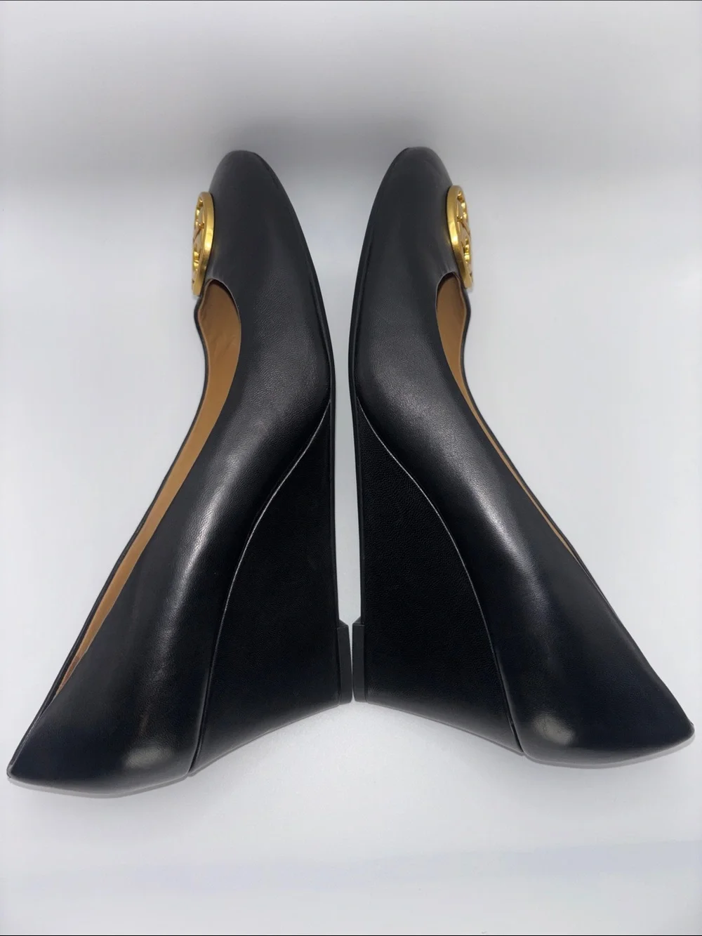 Tory Burch Black Leather Wedges with Gold Logo Medallion